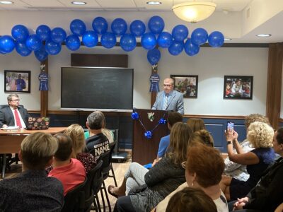 Ohio County Schools on Monday night celebrated Ritchie Elementary School's recently being named a National Blue Ribbon School, and speaking from the podium is Principal John Jorden.
